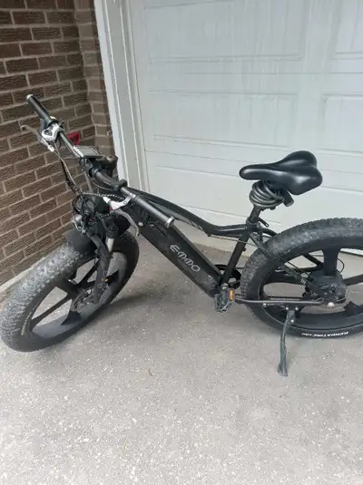 Barely used emmo e wild battery is good with charger tires are also good I bought it used it one sea...