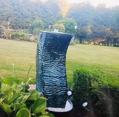 Tall bubbling fountain, View more