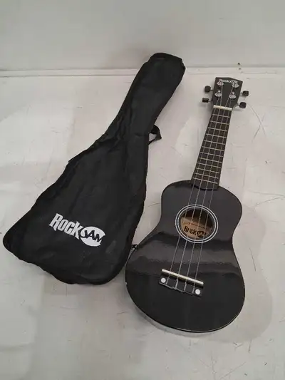 This RockJam Ukulele is a four-stringed instrument with a high gloss finish and nylon strings, perfe...