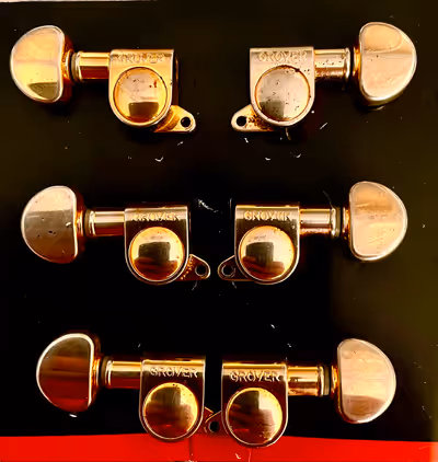 If it is listed it is available. Set of used Gold Grover 3 x 3 14:1 205 series sealed tuners. These...
