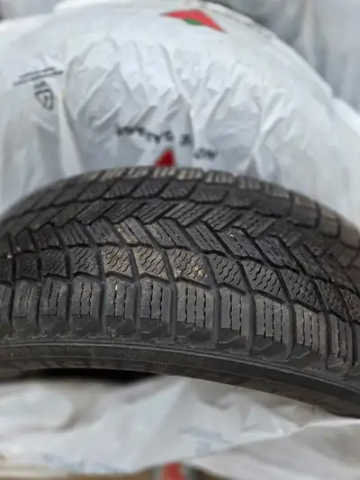 This is a used Michelin X-Ice Snow Tire, perfect for winter driving conditions. The tire provides ex...