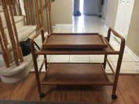 Teak rolling serving table with removable coffee serving tray