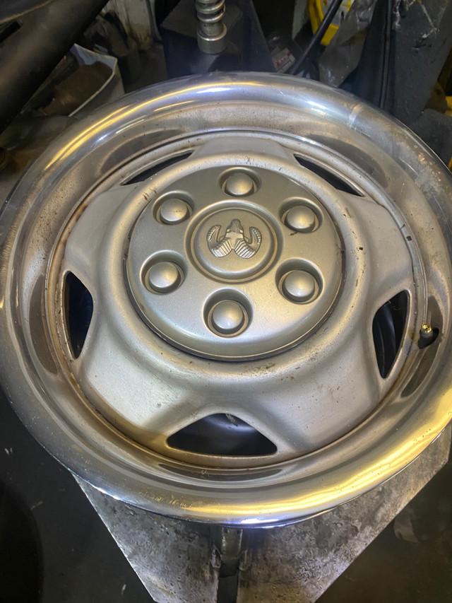 Set of 4 dodge Dakota 15” 6 bolts 6x4.5 with caps & covers $160 in Tires & Rims in Windsor Region