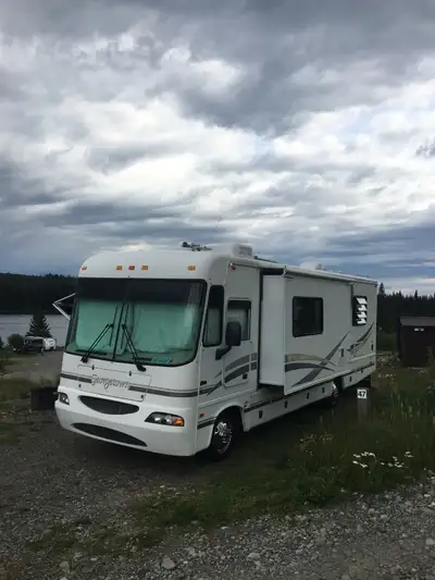 Self contained motorhome with solar, inverter, Onan 4000 watt generator. Six new tires, front brakes...