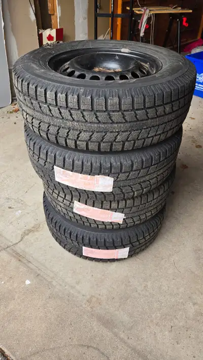 I'm selling a set of four Toyo winter tires, size 205/70R15, with a 5x105mm bolt pattern, originally...