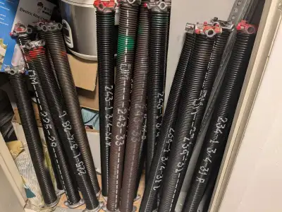(can install if needed) New garage door torsion springs for sale, View more