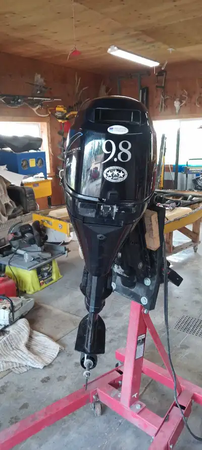 9.8 horsepower Tohatsu four stroke outboard. Complete with shifter and shifter cable. Short shaft, e...