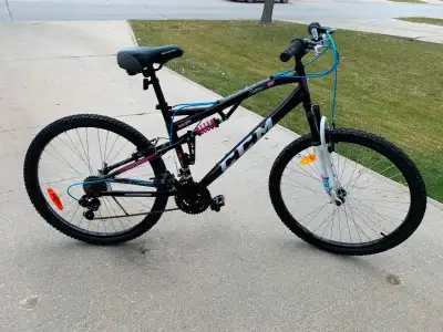 CCM mountain bike (26” wheels). Dual suspension, front/rear hand brakes, quick release seat post. Me...