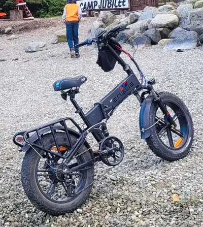 This is an Engwe E-bike that is a folding step-through design with fat tires for all-terrain use. It...