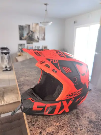 In new condition it has only been used once, Bought the helmet for my first dirt bike and the engine...