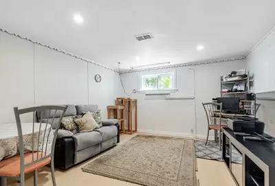 Welcome to the lower unit at 115 Frontenac Ave — a bright and comfortable 2 bedroom, 1 bathroom suit...