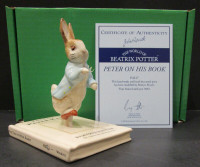 BESWICK 100TH ANNIVERSARY"PETER ON HIS BOOK"FIGURINE,MINT IN BOX