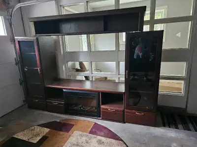 free wall unit with fireplace and end tables, View more
