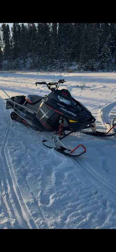 2015 Polaris switchback assault 800 144. Brand new 2 inch track, raws rowdy can. Comes with spare 1...