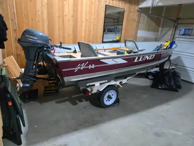 Lund SV 14 with a brand new Yamaha 9.9. motor has about 5hrs on it. Boat is in excellent condition,...