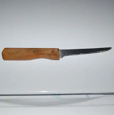 Made in Japan Tang extends about 3 inches into the handle, 2 rivets Blade 5" Overall 10" 20 dollars