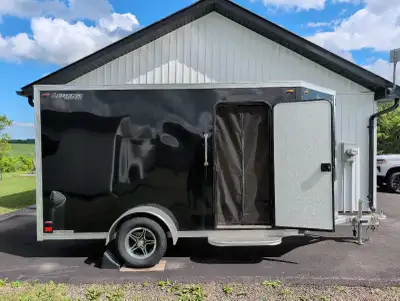 This pre-owned 2024 Legend trailer features a 6x15 ft frame with a 2990 lb GVWR, offering a reliable...