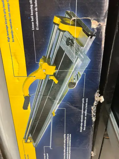 I'm selling a QEP Professional Tile Cutter, perfect for handling tiles up to 35 inches long and 24 i...