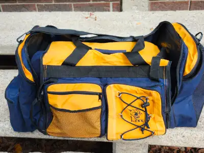 Description Size L 32" x W 20" x H 18". Yellow and navy nylon Used only a few times. Very good condi...