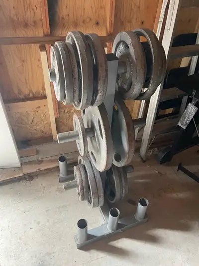560 pounds of Olympic plates and holder $1.30 a pound, View more