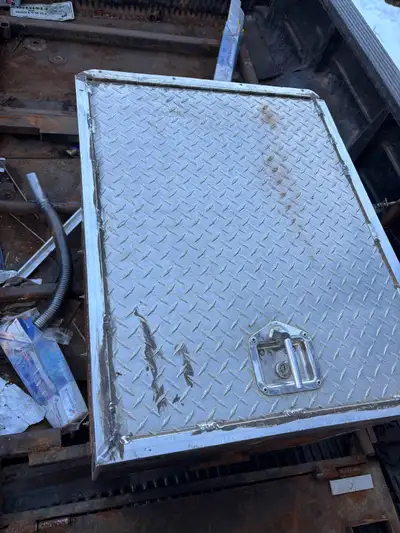 Tool box used in a welding skid has a drawer on the bottom and the top opens with dividers to keep a...