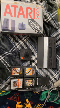 Atari 2600 with box and 5 games