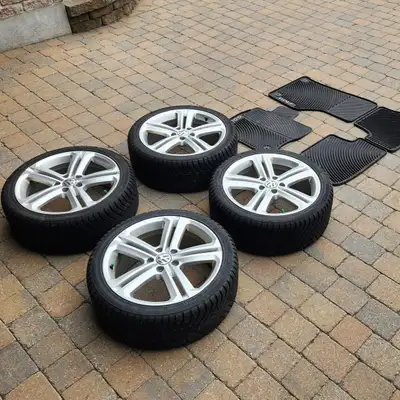 18" VW Rims with Hakkapeliita 10 tires Rims are 5×112 lug pattern and fit Jetta/golf/passat and basi...