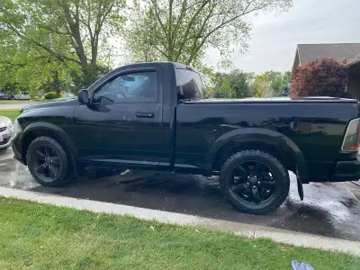 2014 Ram 1500 regular cab. 223,000 kms. 5.7L Hemi. Projector headlights. Dual exhaust aftermarket mu...