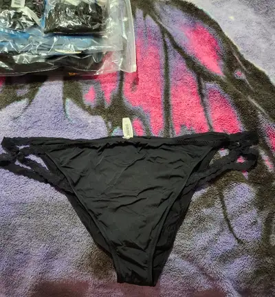 Im selling 1 pair of undies, 3 thongs, 1 top, And 1 nightdress All brand new, never worn, most of th...