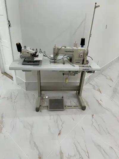 I'm selling a used Fujitech sewing machine that is perfect for garment businesses. It includes an ov...