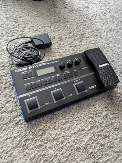 Boss Gt1 guitar multi-effects and amp modeling unit, View more