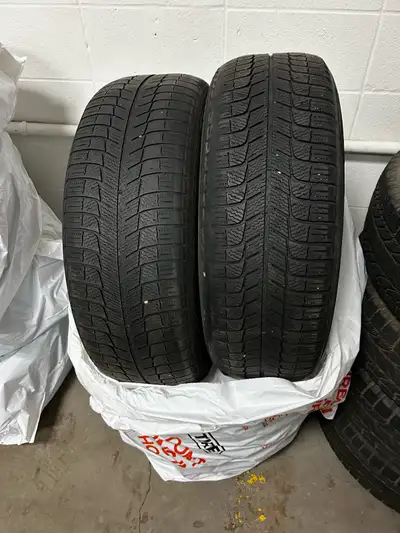 Michelin X-Ice Cleaning out all family tires. Price is per set of 4. Well kept and always stored in...