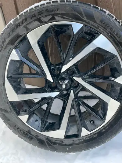 4 x 255/45 R20 tires on rims. Were on a 2022 Mitsubishi Outlander.