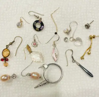 Selection of single earrings, View more