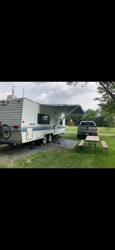 1994 cobra sunrise camping trailer. About 25 feet long. Queen bed in the front, couch and table both...