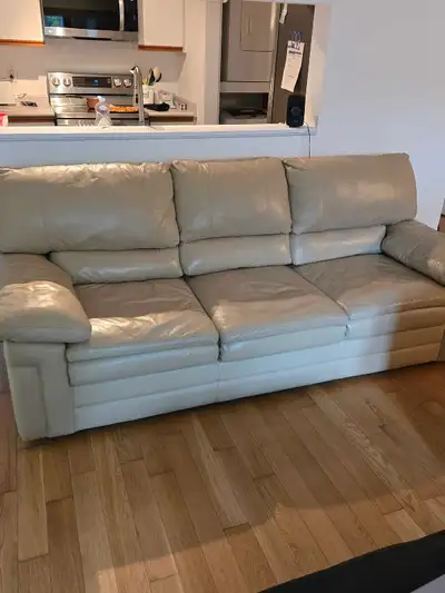 Cream colored leather couch, View more