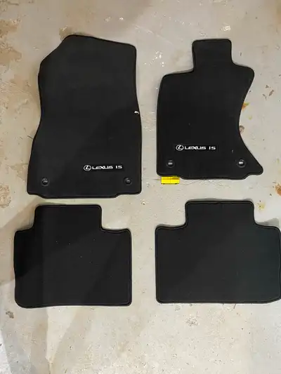 Enhance the interior of your Lexus IS with this set of genuine Lexus IS AWD FM black floor mats (Par...