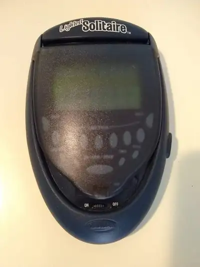 Radica Lighted Solitaire 2003 Handheld Electronic Game Model 740, View more