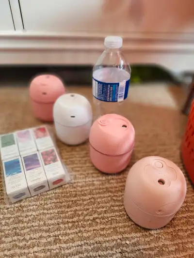 4 small humidifiers with scents, View more