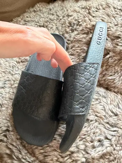 Gucci Athetic women’s monogram embossed slides , View more