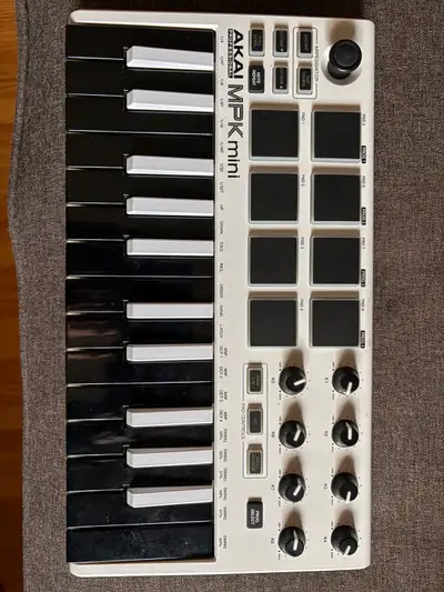 Selling my Akai MPK Mini MIDI keyboard, perfect for on-the-go music production featuring 25 velocity...