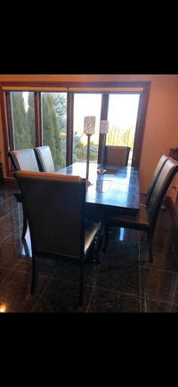Modern dining table with 6 leather chairs