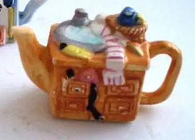 Red Rose mini teapot old dresser style . Mint condition Asking $15.00 OBO Measures 1.5 x 1.5