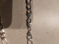 Silver Figaro Chain 26 inches. Condition: Brand New! $430!