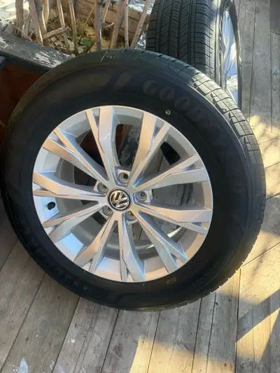 Almost brand new goodyear all season with vw wheels Only driven 1k km