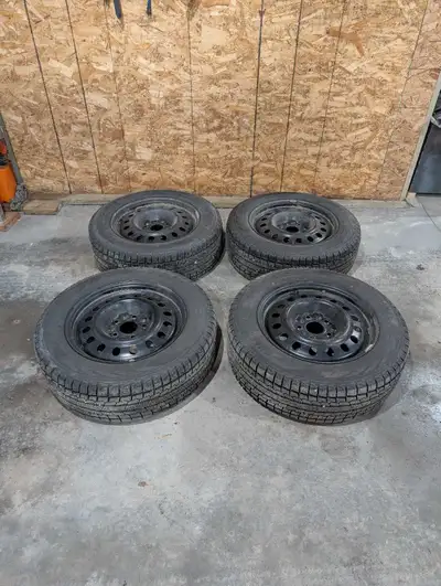 Set of Four 225/65 R17 Winter Tires and 17" 5x127mm bolt pattern Steel Rims Only used for 1 Winter T...