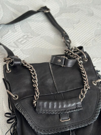 Genuine leather bag with silver chain details and fringe