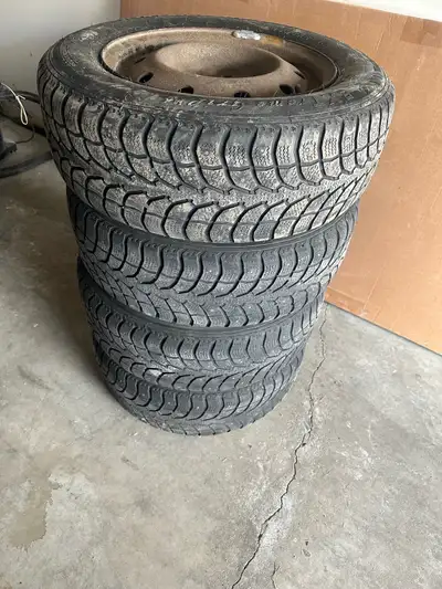 4 - 205/65R15 5x114.3 Studded Winter Tires. Tires are mounted and balanced. No dents, no leaks. Shou...