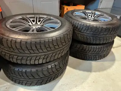 Four 18" Alloy Rims and Four 235/60 R18 BFGoodrich Winter TA tires, in excellent condition . 5 bolt...