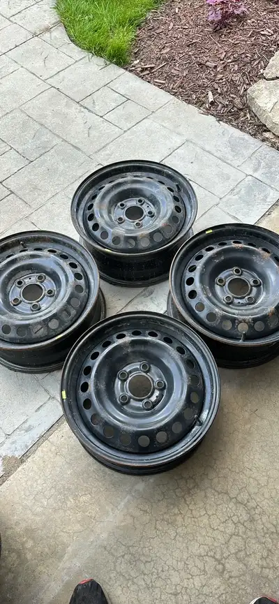 Set of four OEM Nissan Sentra steel rims. 5x114.3 mm bolt pattern. 66.1 mm center. Good condition. W...